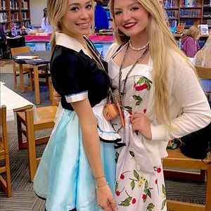 Women’s 1940’s white dress with Cherry’s styles dress.